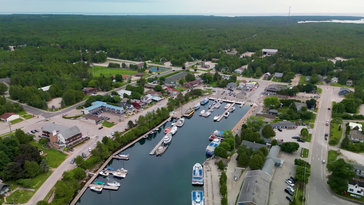 Aerial View of a Small Coastal Town with a Bustling Marina