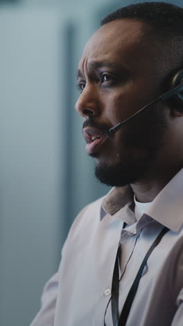 man working in a call center