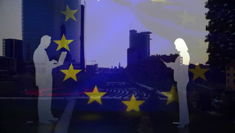 flat design silhouettes using laptop and tablet over european skyline featuring eu stars overlay