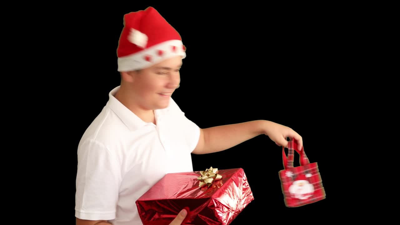 녹색 스크린 배경 1에 크리스마스 선물을 가진 어린 소년