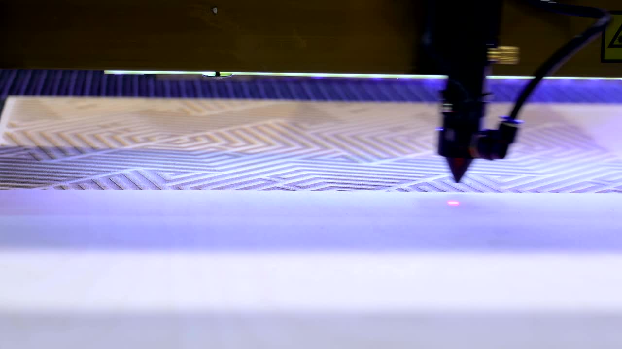 CNC burning laser woodworking wood processing machine, modern technology in the industry.