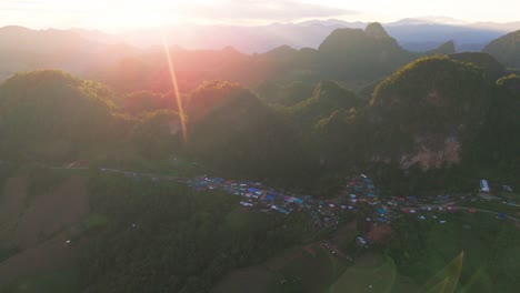 aerial sunset of ban jabo remote village in mae hong son province of norther thailand , home oflahu tribes