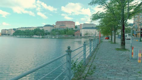 helsinki harbour views with cobbled promenade with architectural buildings in the background, finland.