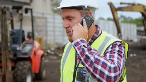 male worker talking on mobile phone 4k