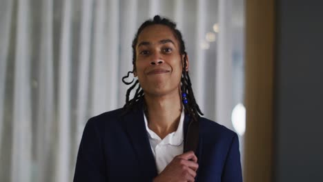 Portrait-of-mixed-race-man-looking-at-the-camera-and-smiling