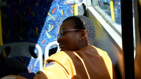 Couple-taking-selfie-on-mobile-phone-while-travelling-in-bus-4k