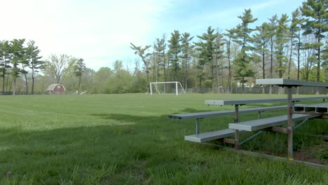 Horizontal-panning-shot-of-a-soccer-field-as-seen-from-the-fan's-perspective