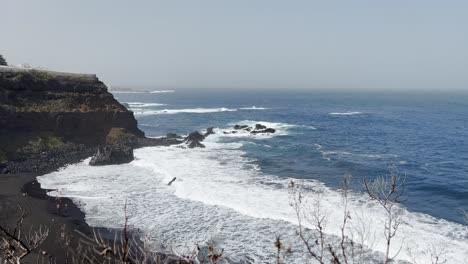 Sunny-day-at-a-black-sand-beach-in-Tenerife