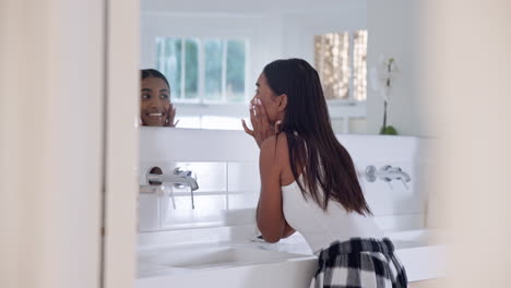 Skincare,-woman-and-touching-face-in-mirror