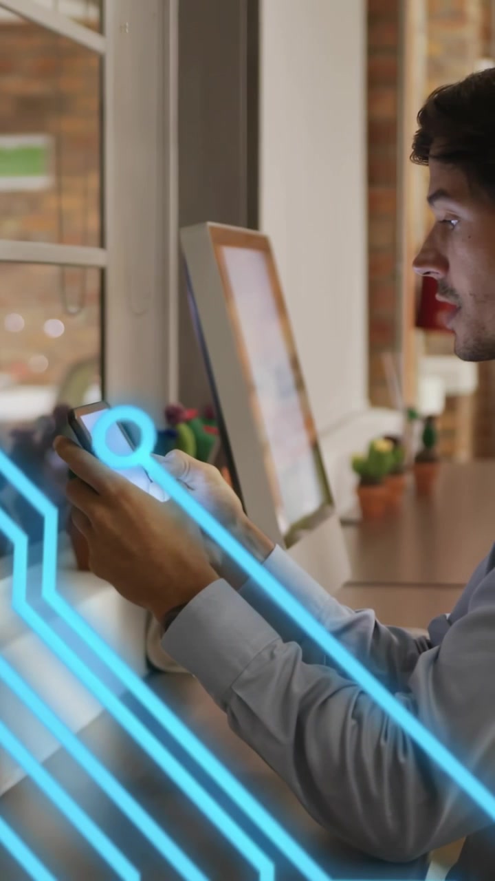 Vertical video: Man tapping phone, tap starting blue circuit overlay tracing taps for app testing