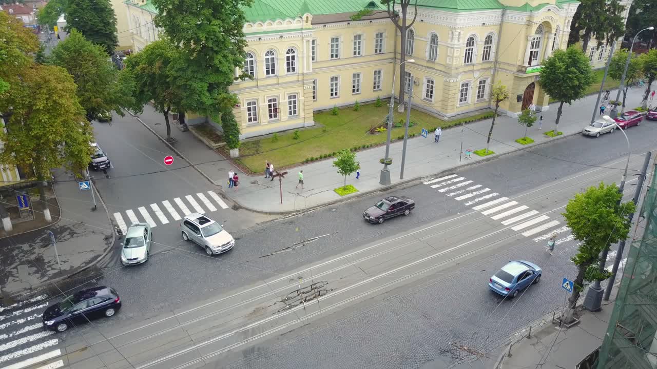 Busy Traffic Of Cars On The Crossroads. VINNITSA, UKRAINE - JULY 2017: Aerial shot of the busy traffic of cars on the crossroads of the city