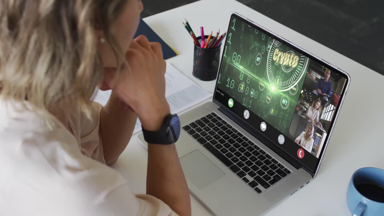 Video of caucasian woman having crypto currency video call on laptop with diverse coworkers