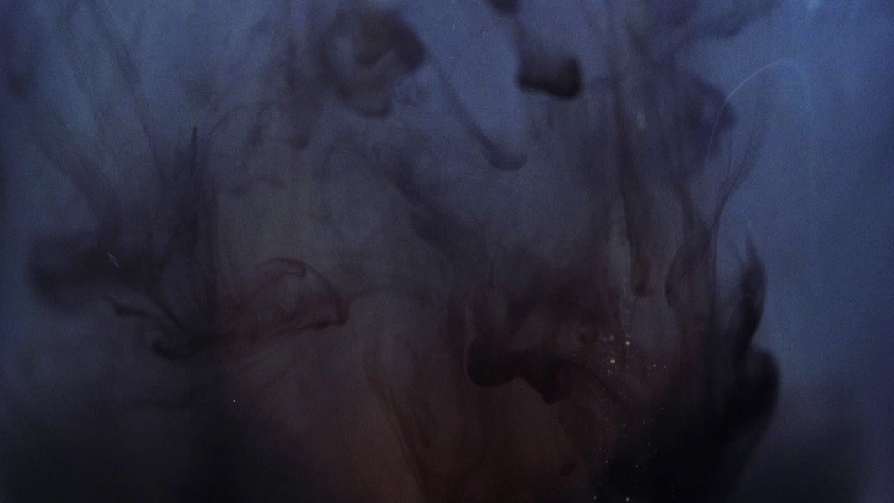 Paint floating in water looking like majestic nebulas. Stable shot with the Sony a7iii