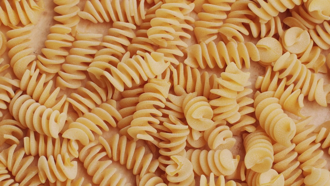 Close-up of Uncooked Dry Fusilli Pasta