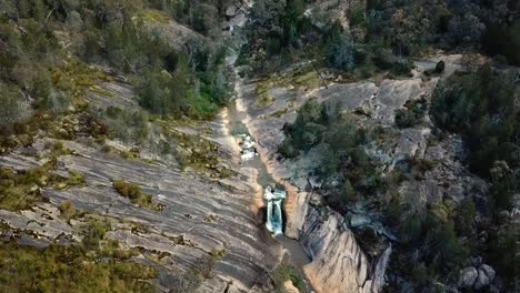 zooming out aerial view of the beechworth cascades, at beechworth in north-east victoria, australia november 2021