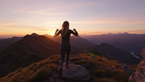 woman running on mountain at sunrise