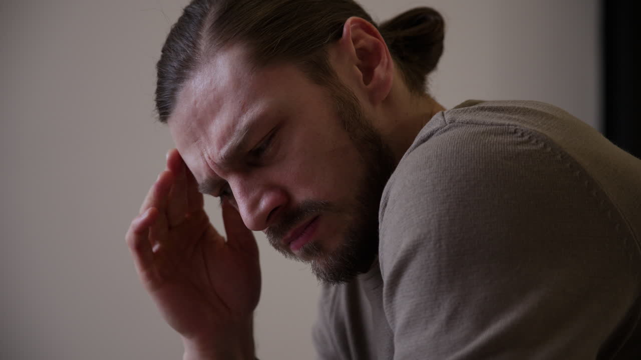 Caucasian man with headache