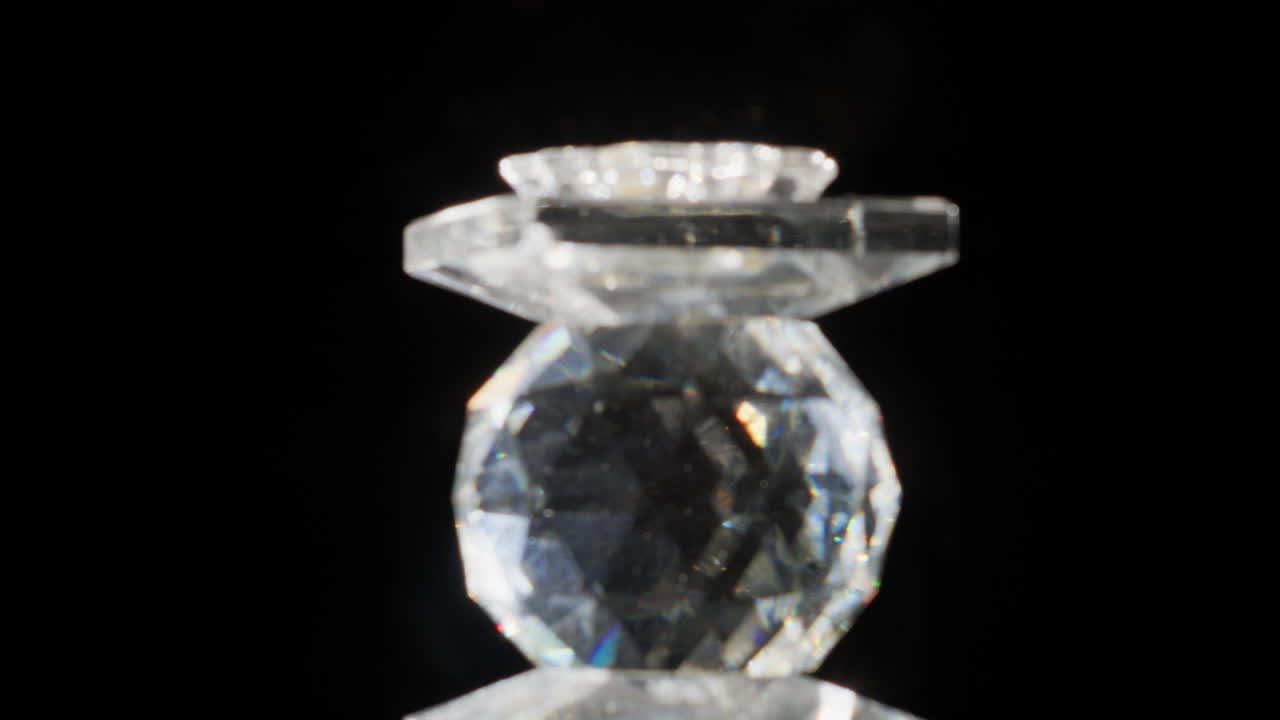 Glass Jewel Rotating And Shining On Light Abstract Overlay Effects On Black