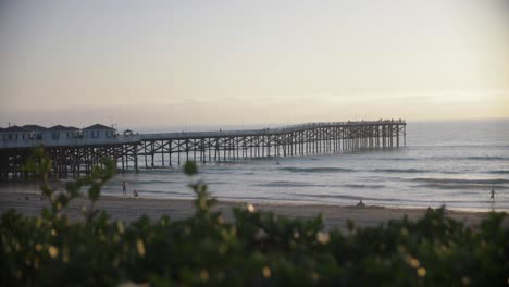 Beautiful-4k-shot-of-the-crystal-pier-at-pacific-beach-in-San-Diego-southern-California-on-a-warm-and-sunny-day-while-sunset