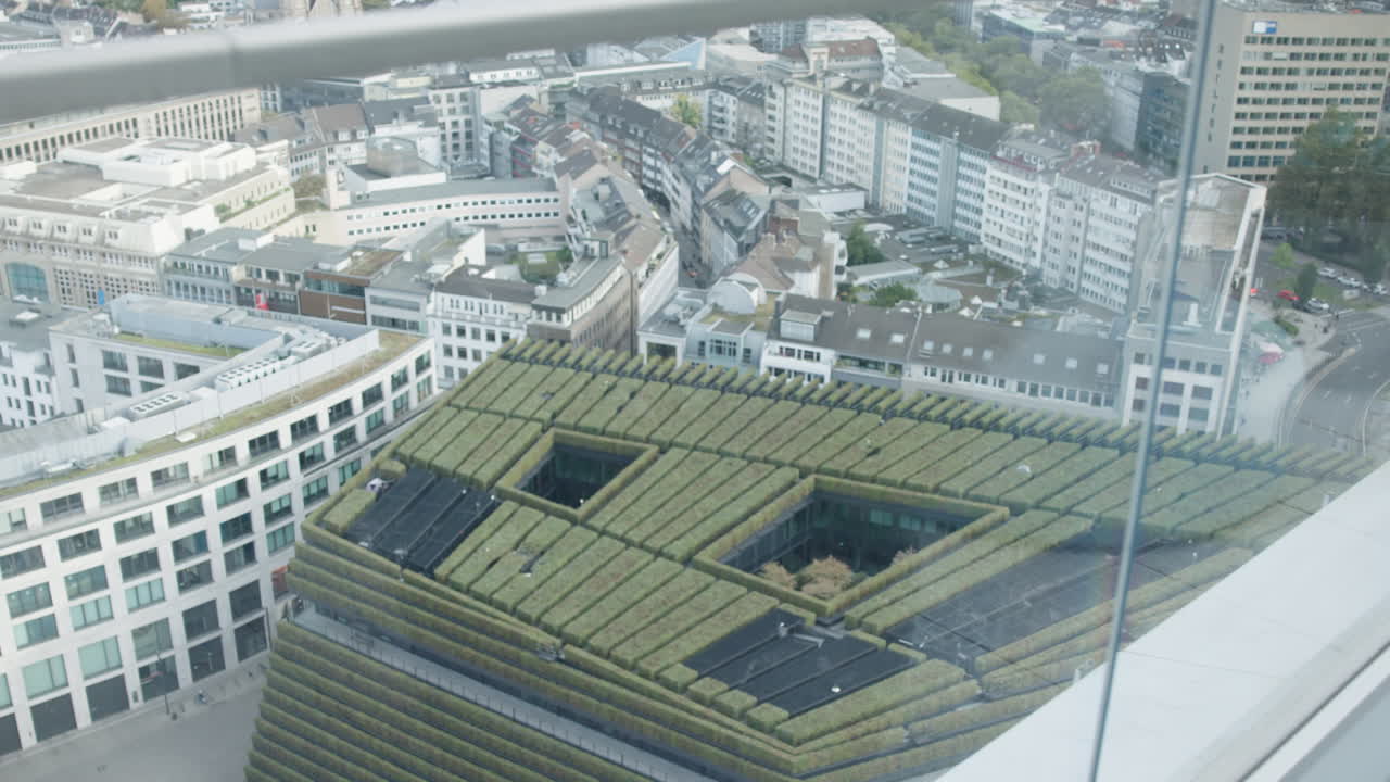Shot from the top of Dreischeibenhaus, showing the city and the Kö Bogen from above
