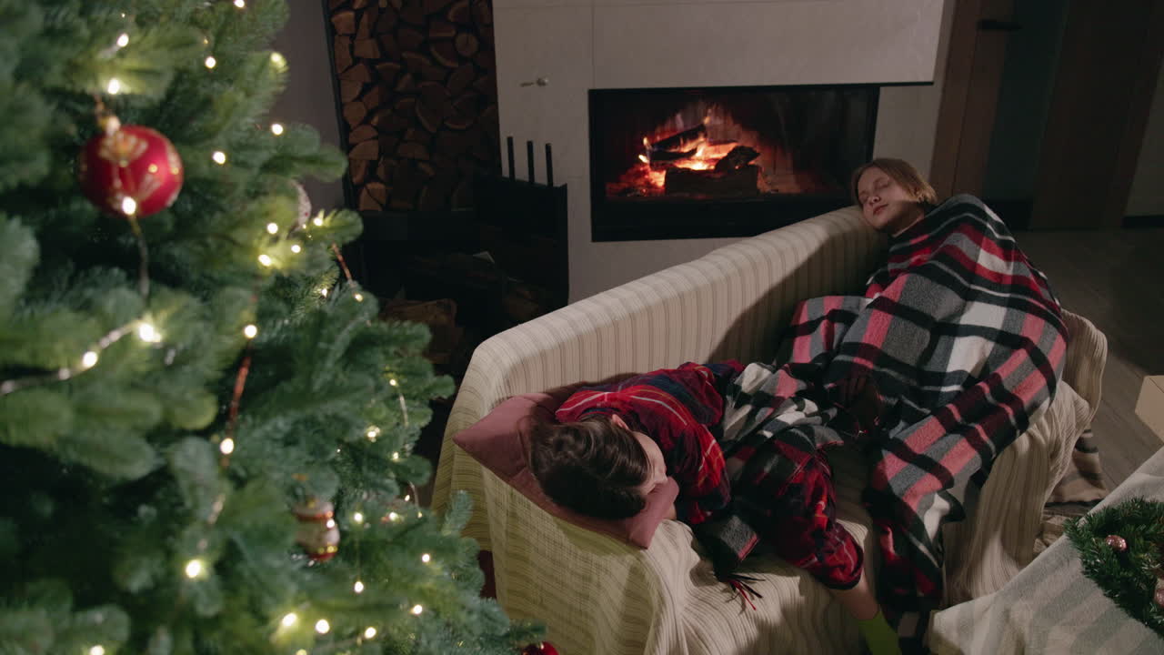 Children Sleeping by the Fireplace on Christmas