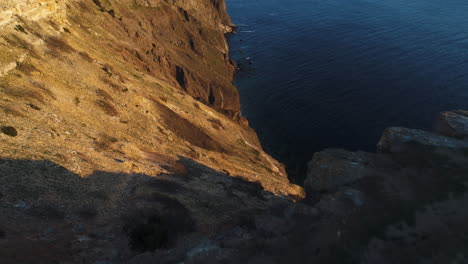 coastal cliffside at sunset/sunrise