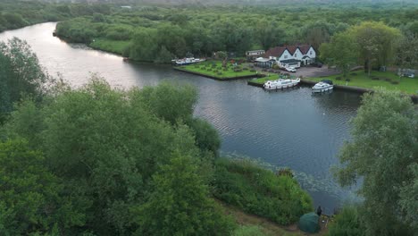 a breathtaking aerial view of extensive forests lining the banks of the river yare in norwich