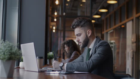 businessman working in a cafe