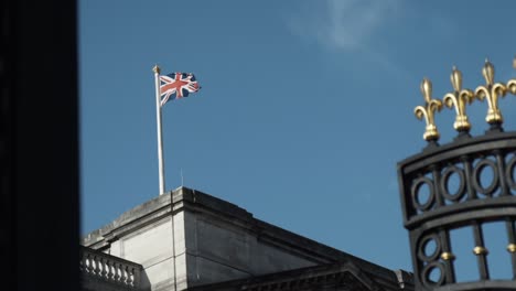 british flag flying above a building