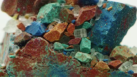 close-up of colorful crystals and mineral aggregates showcasing diverse textures and vibrant hues in a glittering display of nature's beauty