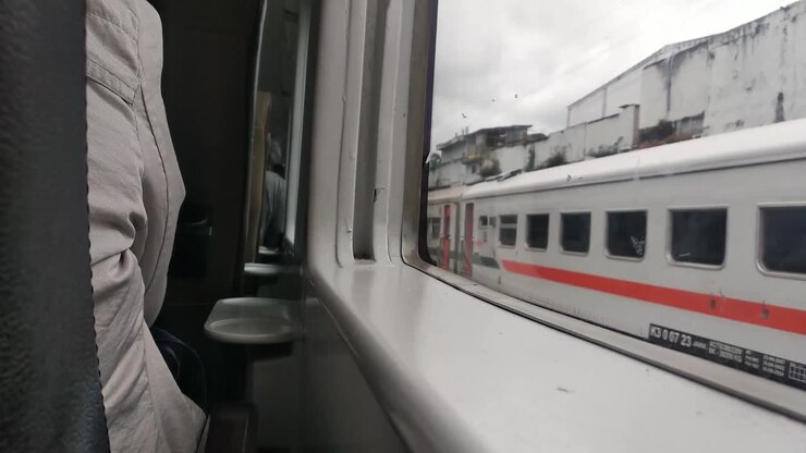 Situation inside train from passengers views in Depok, West Java, Indonesia