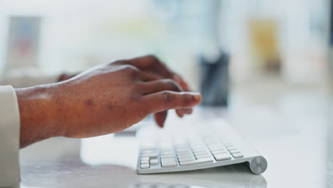 Hands,-typing-and-computer-research-for-business