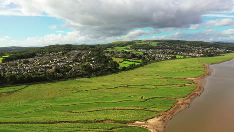 aerial landscape of a countryside coastal village in the english lake district, on a bright sunny day