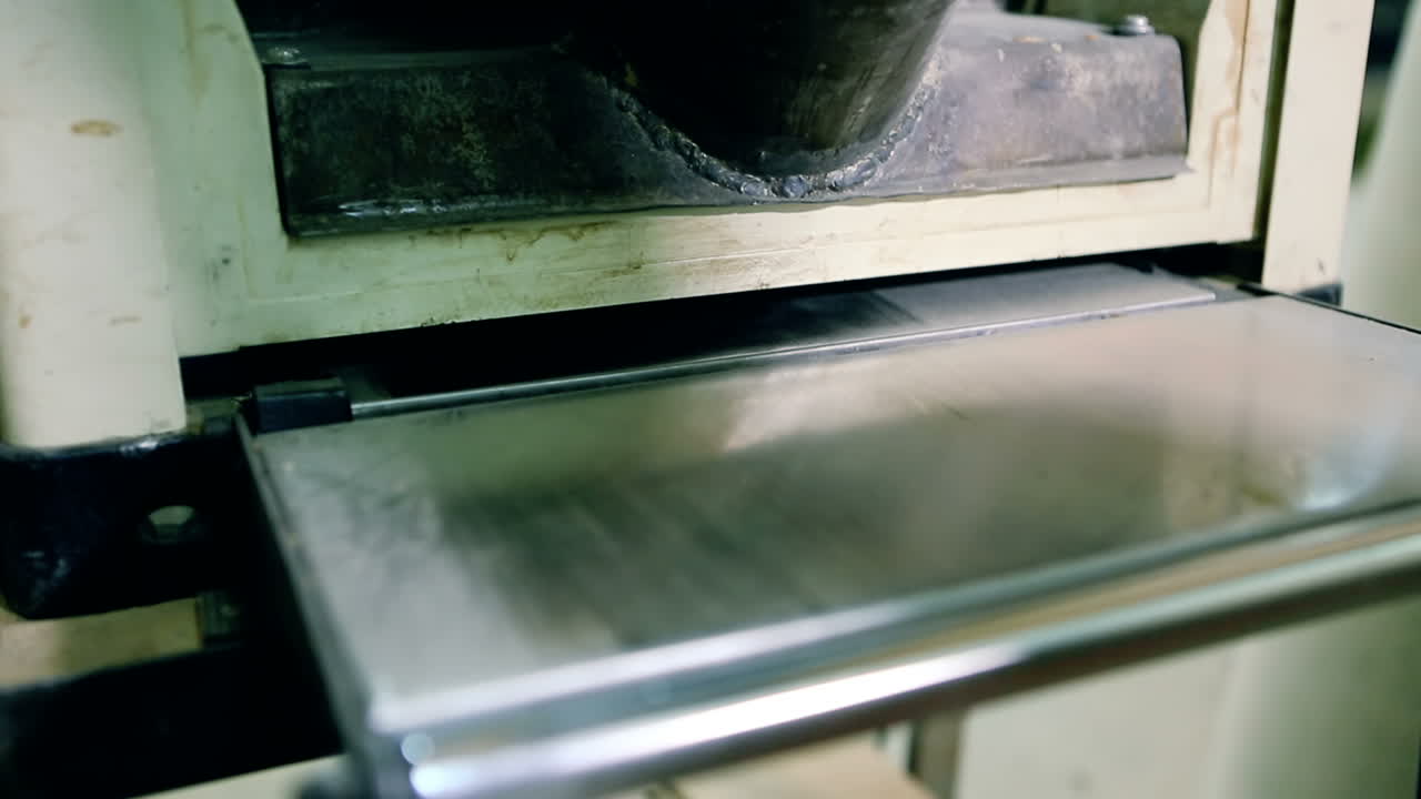 Sawing A Wooden Plank With Jig Saw. Man uses an electric saw to cut wooden planks