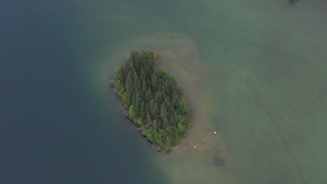 drone flies over islands in azouzetta lake