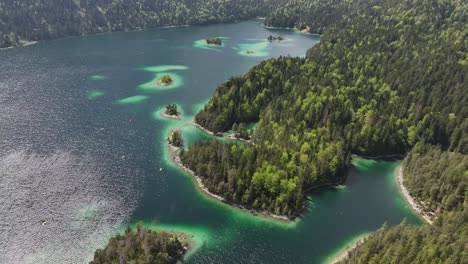 Discovering-from-above-the-marvelous-Eibsee-Lake-in-Grainau,-Germany