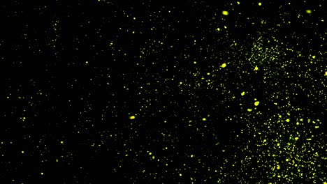 yellow particles on black background