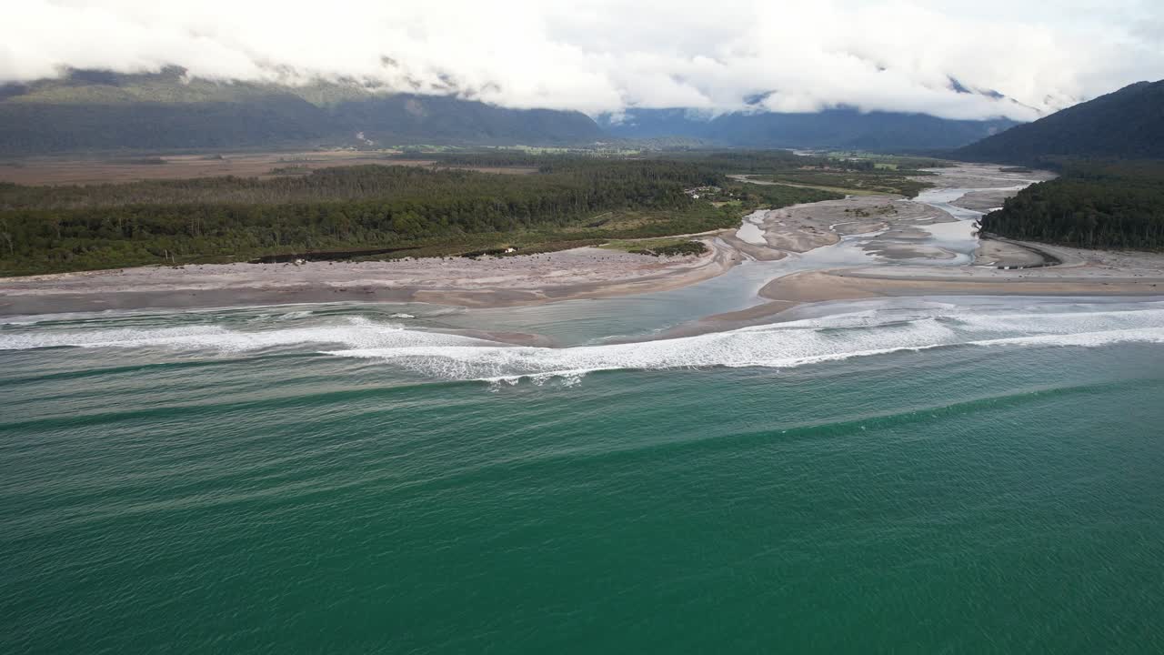 Maori Beach And Mahitahi River Seen From The Bruce Bay In West Coast, South Island, New Zealand. - aerial shot