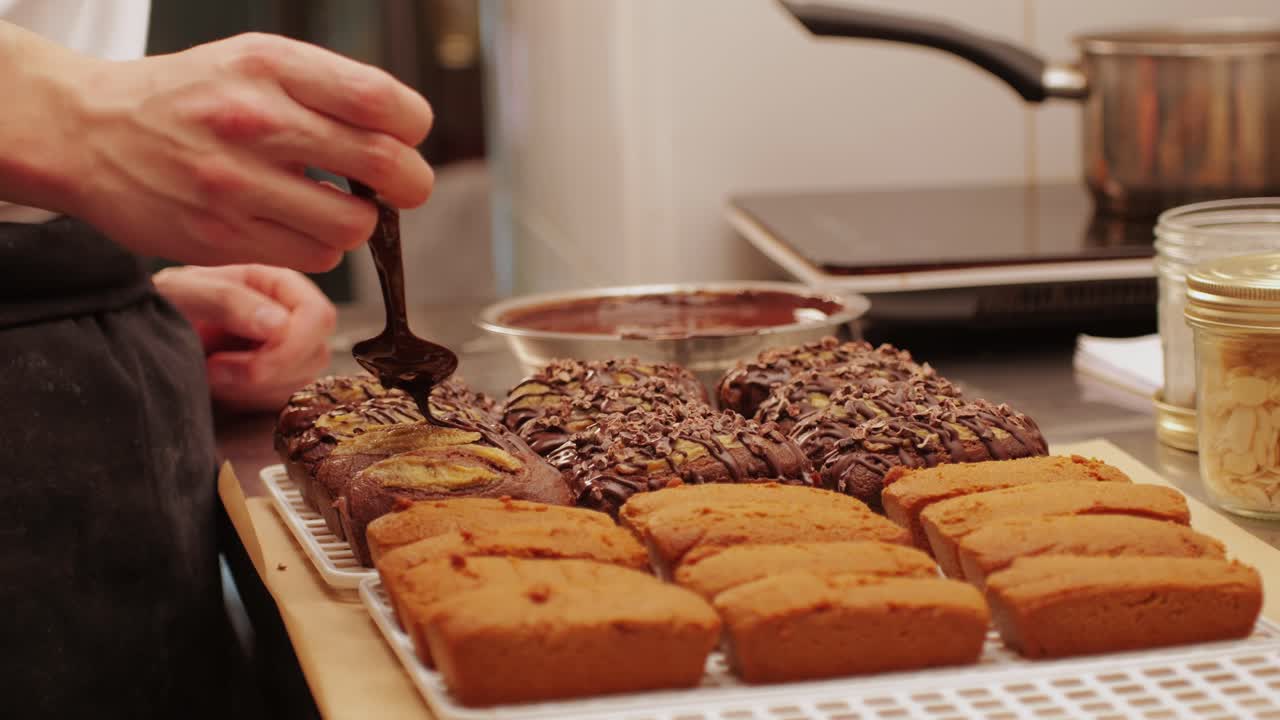 Fresh bake double chocolate banana artesian bread in bakery shop close-up. Artisan bread is making by skill bakers using natural and high-quality ingredients. Food with health and flavour benefits. Sweet breads for dessert and breakfast