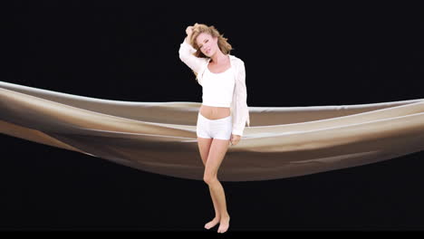 animation of caucasian woman dancing over floating cloth on black background