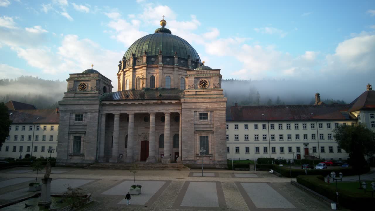 Timelapse of sunrise in a cloudy day at Dom Saint Blasien Cathedral in Swartzwald (Black Forest Germany)