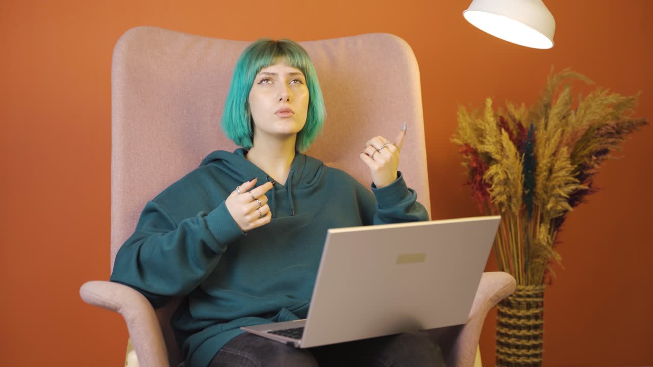 Confused young woman thinks and can't figure it out.