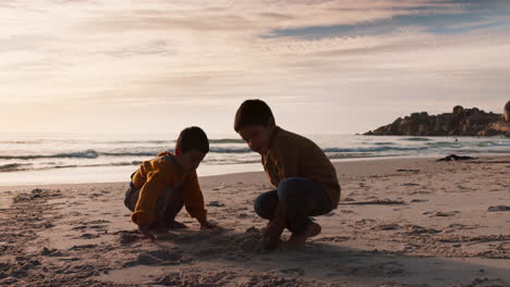 digging, playing and children at the beach