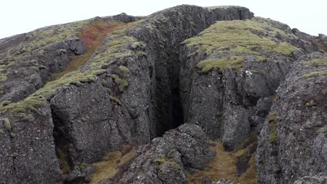 Flying-into-volcanic-Lambafell-fissure-in-rocky-Iceland-landscape