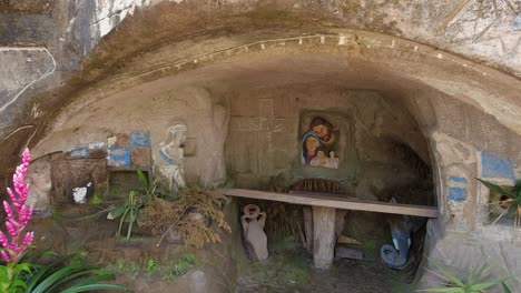 christian religious niche carved into stone wall at el jalacate, nic