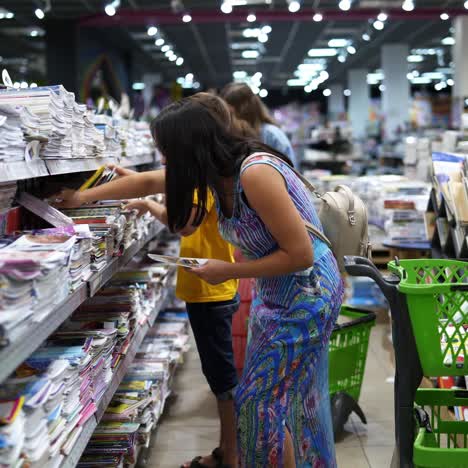woman buys school supplies