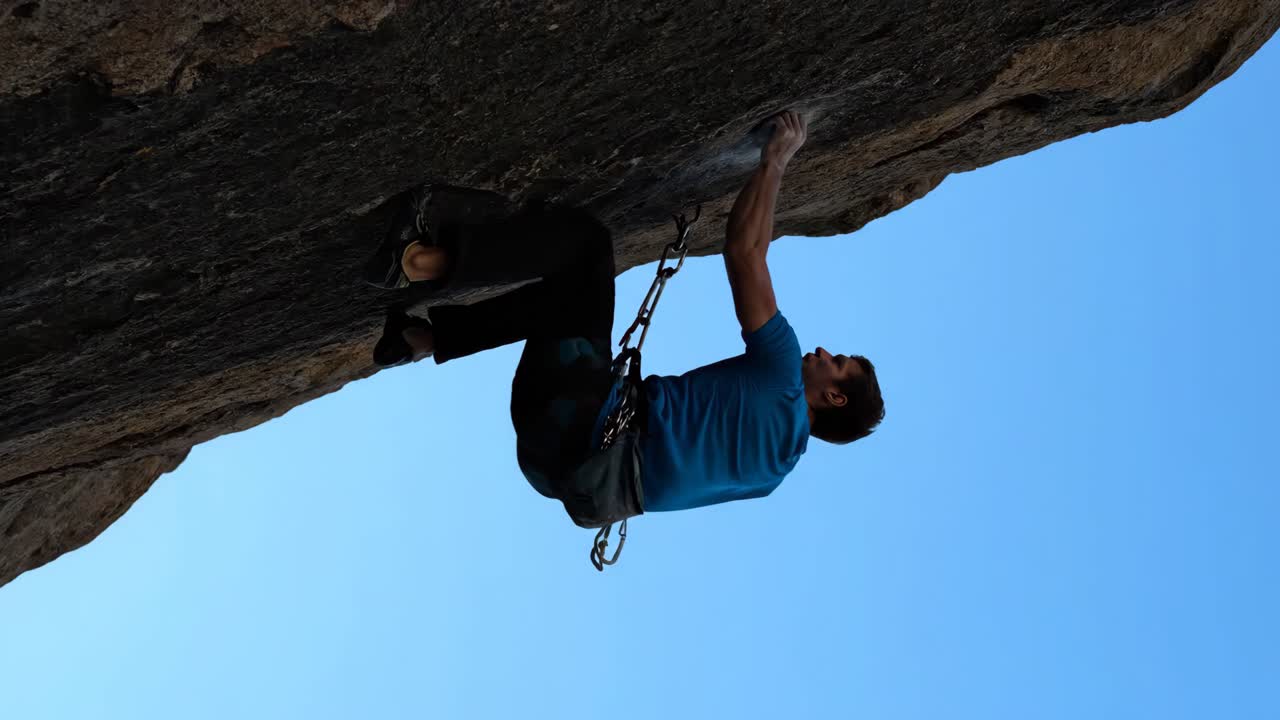 Rock Climber on Overhang