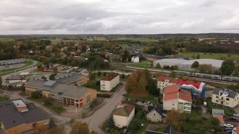 Drone-flying-over-city-a-autumn-day