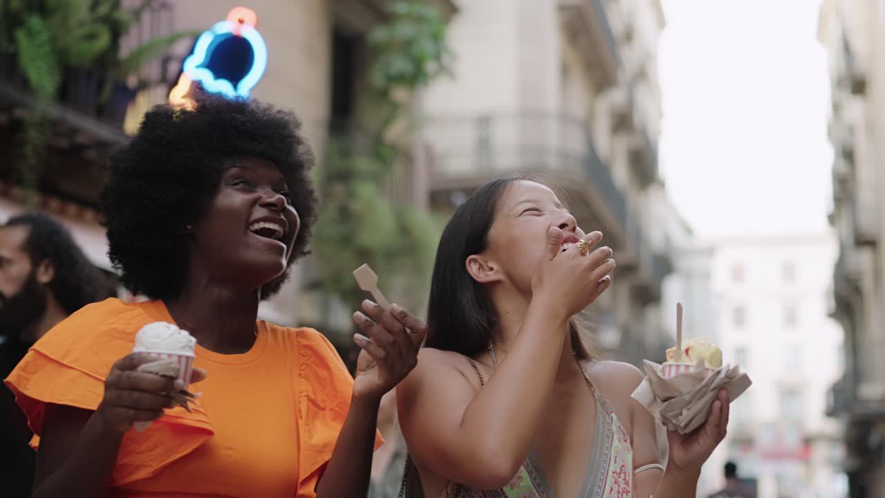 Two Women Enjoying Ice Cream in the City
