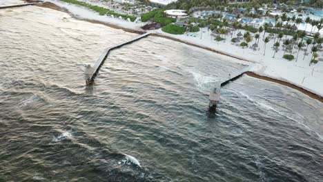 Aerial-View-Of-Wooden-Jetties-At-Riviera-Maya-Coast,-Yucatan-Peninsula,-Quintana-Roo,-Mexico